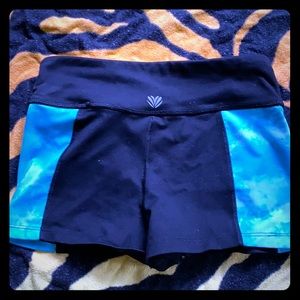 Teeny, tiny athletic shorts. Brand unknown.